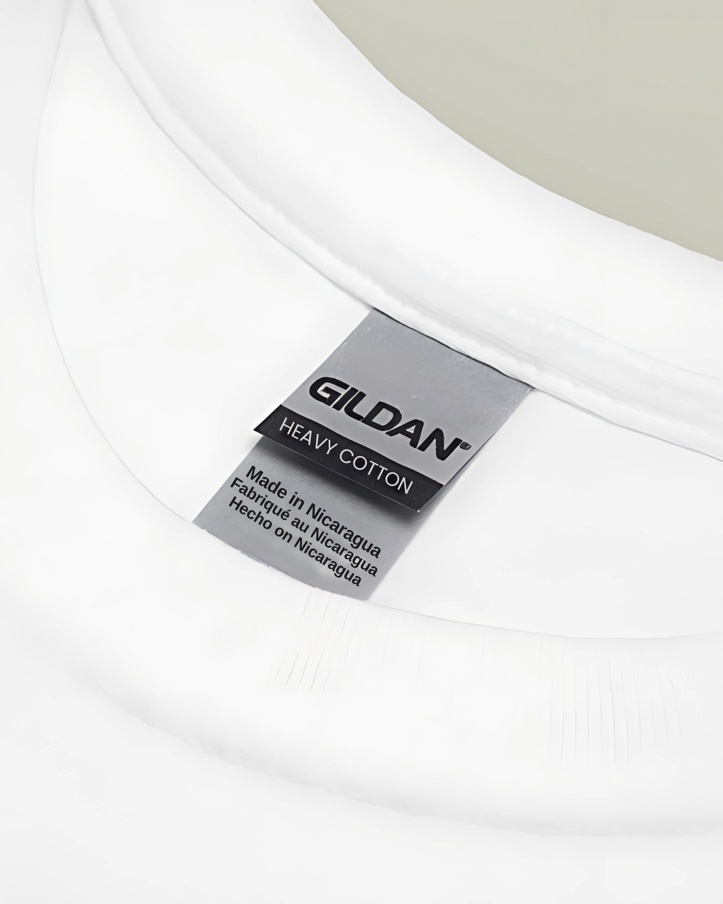 Gildan label on a white t-shirt with 'Made in Nicaragua' text