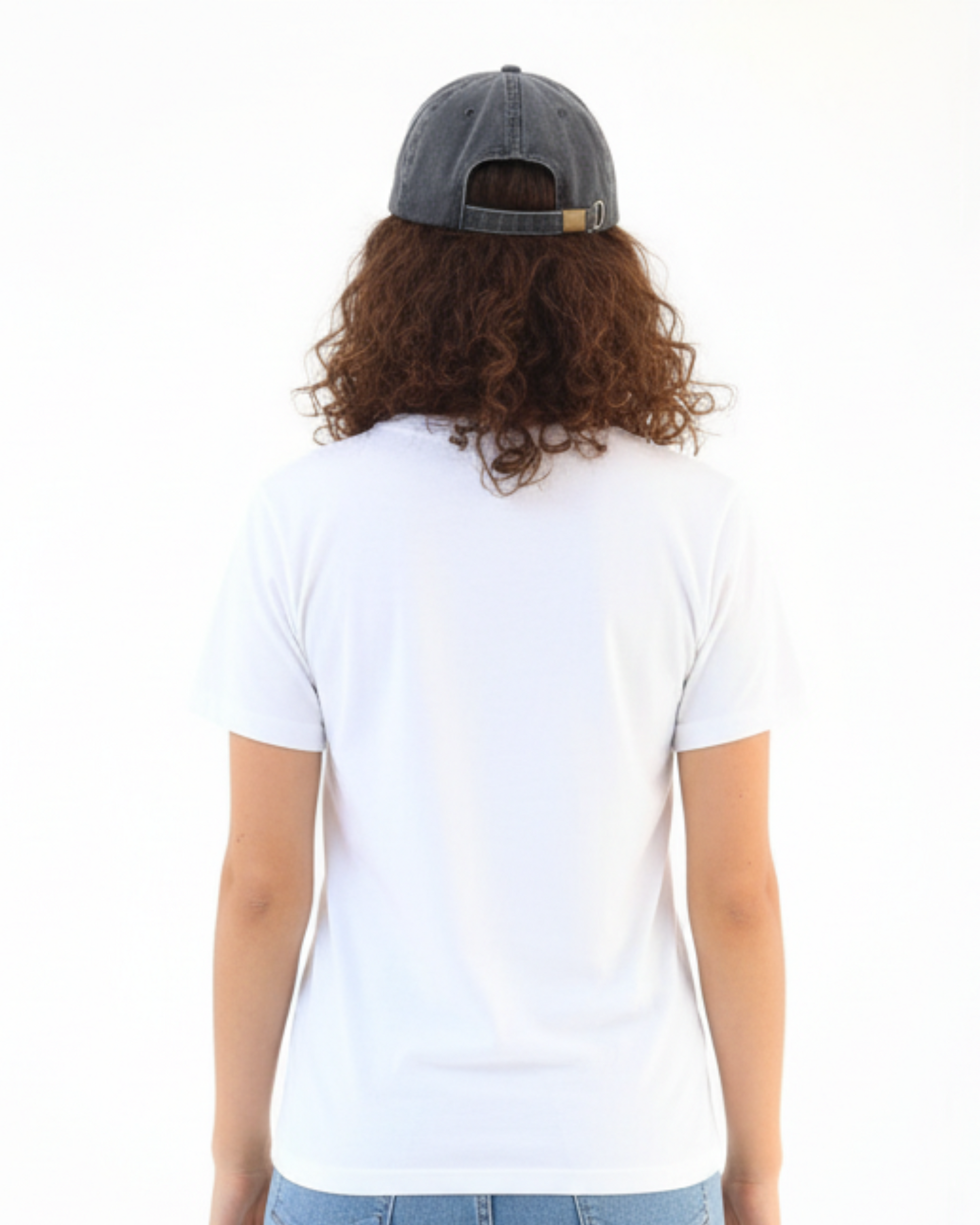 Person wearing a white t-shirt and gray cap from behind on a white background